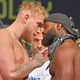Jake Paul and Tyron Woodley face off during the weigh-in event at the State Theater prior to their August 29 fight on August 28, 2021, in Cleveland, Ohio.